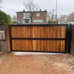 buiten poort teak en staal